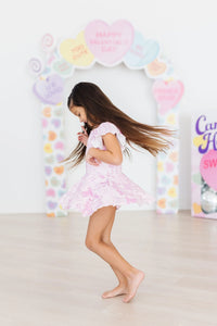 Girls pink Twirl leotard short sleeve with skirt detail by Mila & Rose for dance
