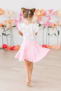 Girls pink and white flutter leotard leotard with short sleeves and floral design by Mila & Rose