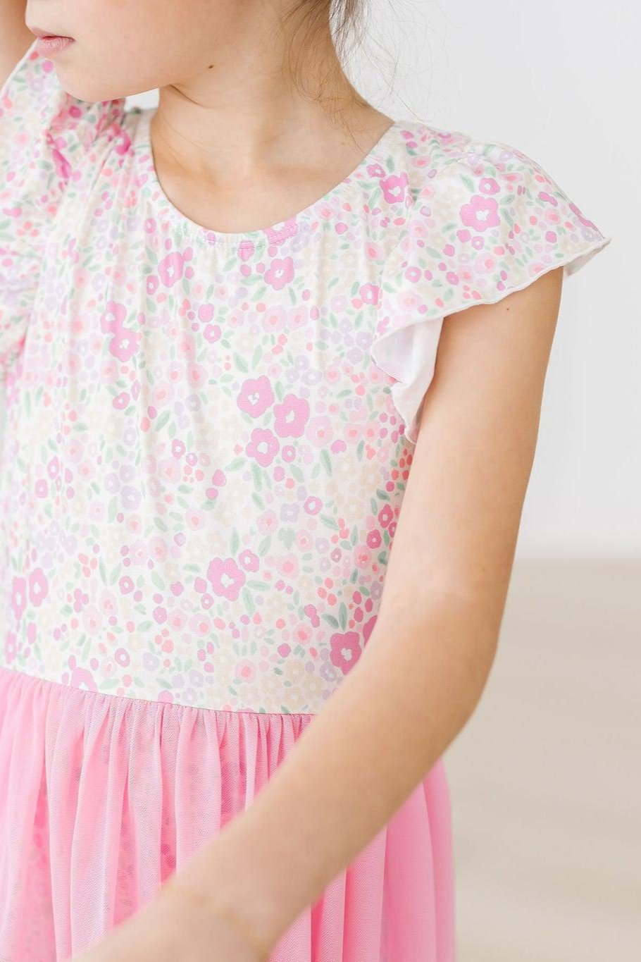 Girls pink and white twirl leotard leotard with mesh skirt and floral pattern short sleeves