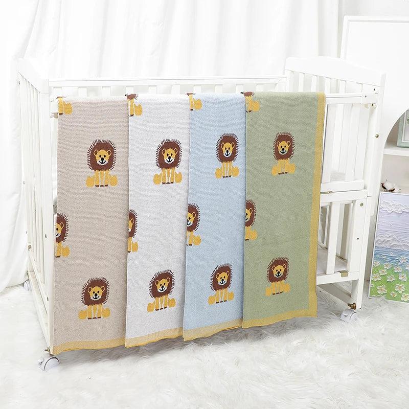 Lion baby blanket cotton in beige, gray, blue, and green with cute lion design for babies