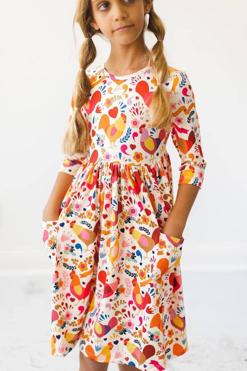 Girls twirl pocket dress in colorful little red hen girls dress print with 3/4 sleeves