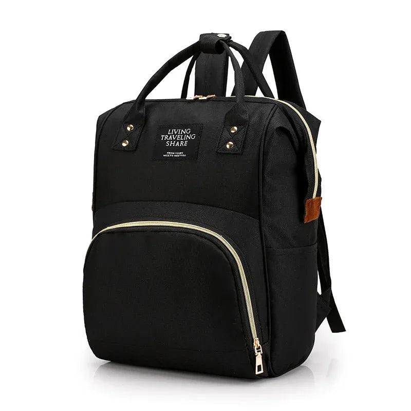 black multifunctional insulated diaper bag with gold zippers designed for babies and kids accessories