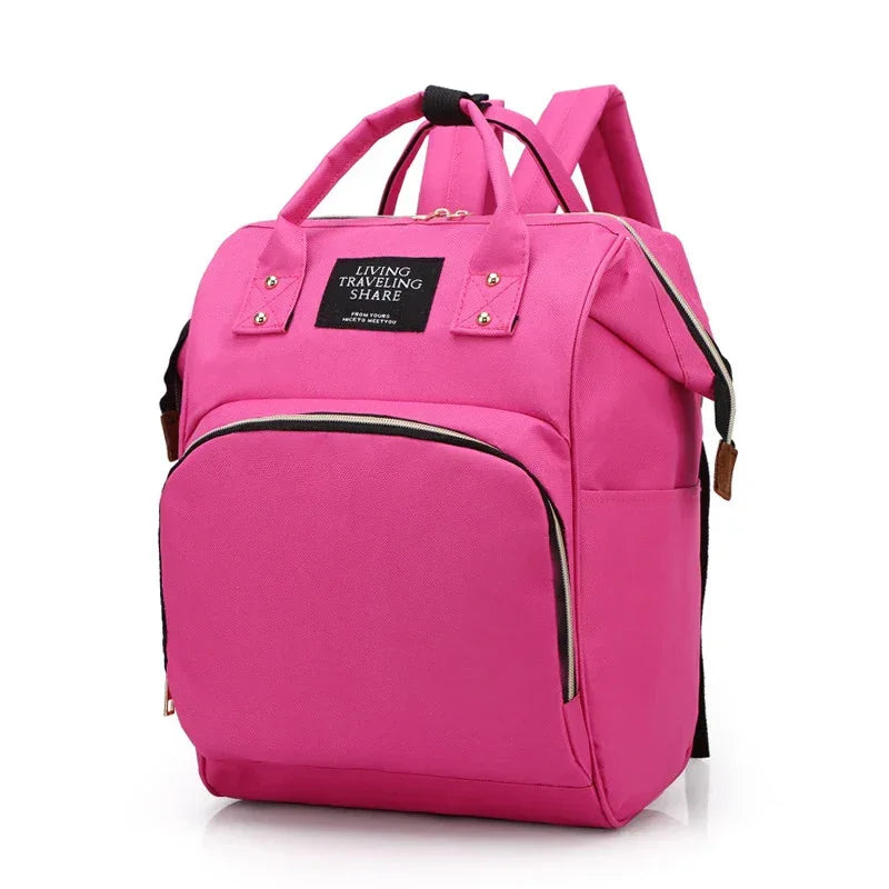 pink multifunctional insulated diaper bag backpack for babies and kids with multiple pockets