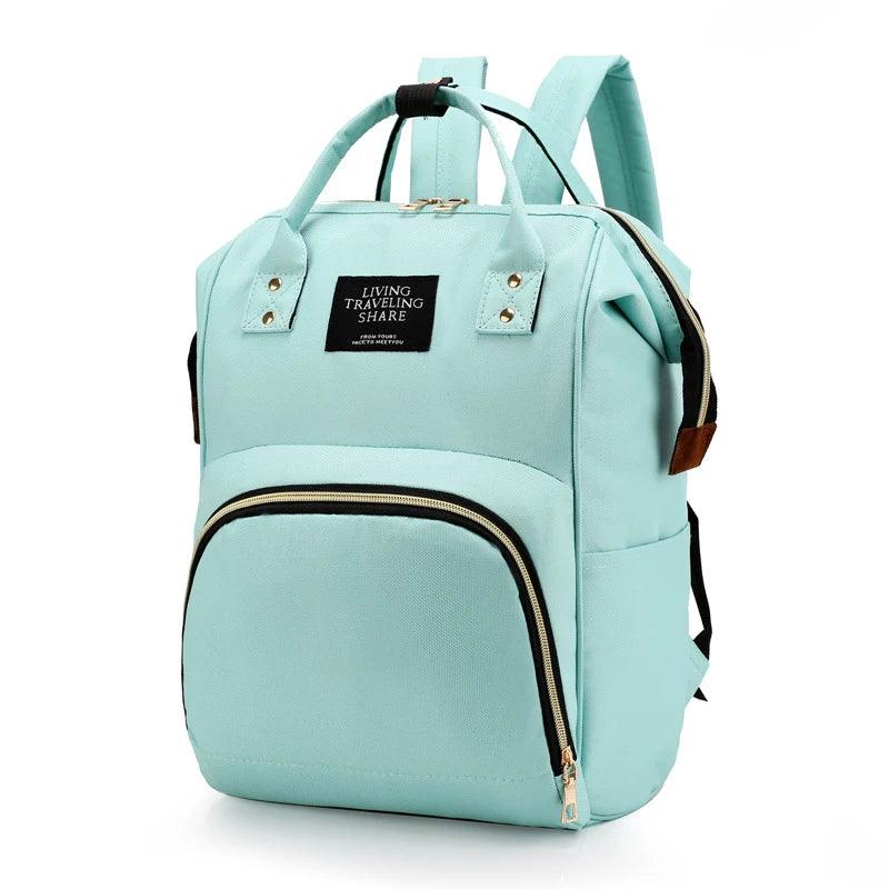 mint green multifunctional insulated diaper bag for babies and kids with multiple pockets and backpack straps