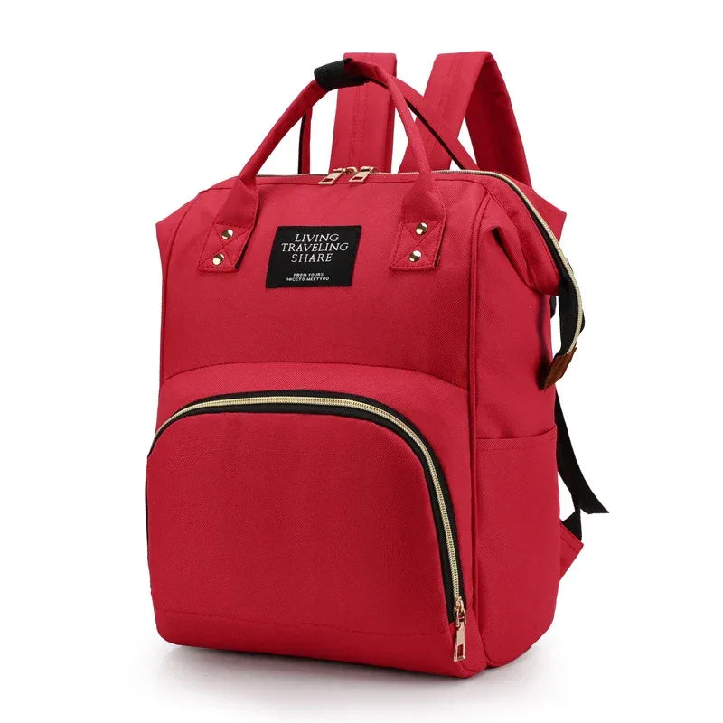 Red multifunctional insulated diaper bag backpack for babies and kids with multiple compartments