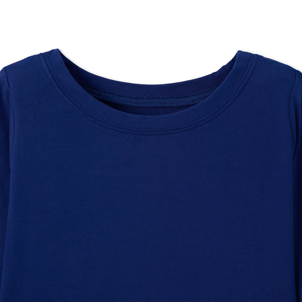 Close up of crew neck collar showing flat seam stitching on navy bamboo fabric