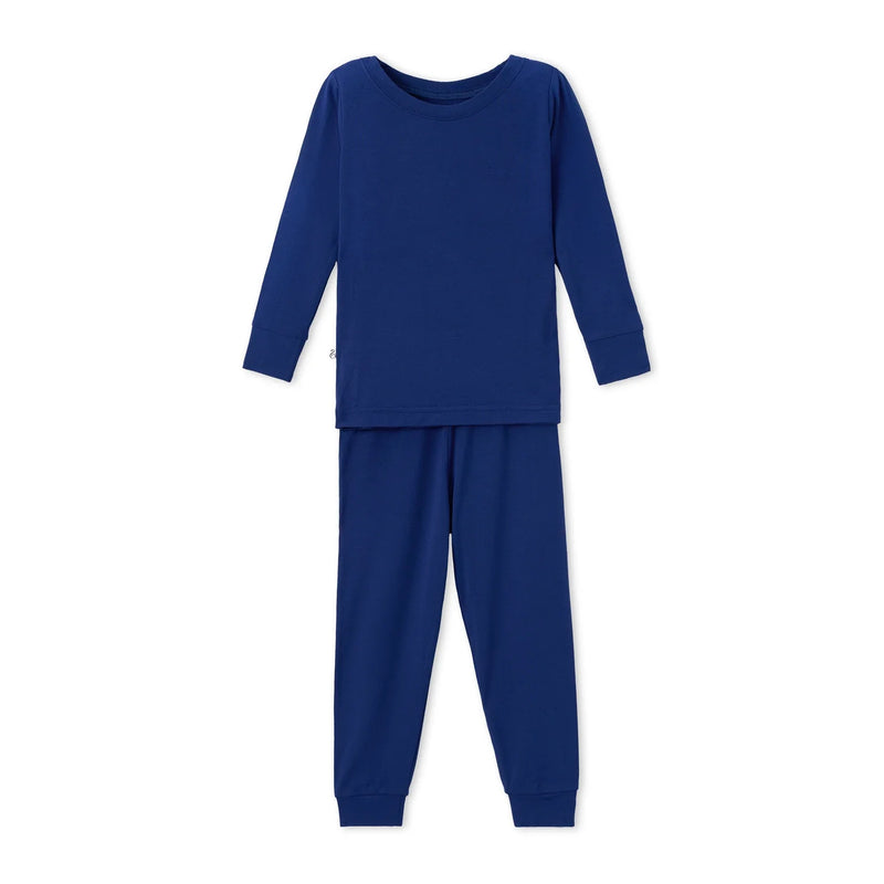 Deep navy blue long sleeve bamboo toddler pajama set laid flat on white background