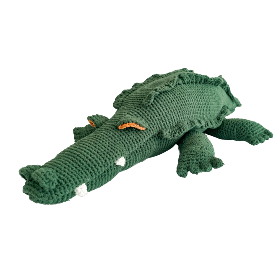 Large green crochet crocodile plush with a long body, toothy face, and detailed ridged back made from organic cotton.
