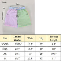 Kids pastel pink and green seersucker trunks with blue waistband and white drawstring, sizes from 12 months to 6 years matching seersucker swimsuits for siblings