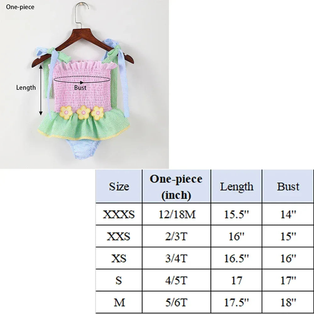 toddlers pink green one-piece seersucker swimsuit with flower accents for matching seersucker swimsuits for siblings