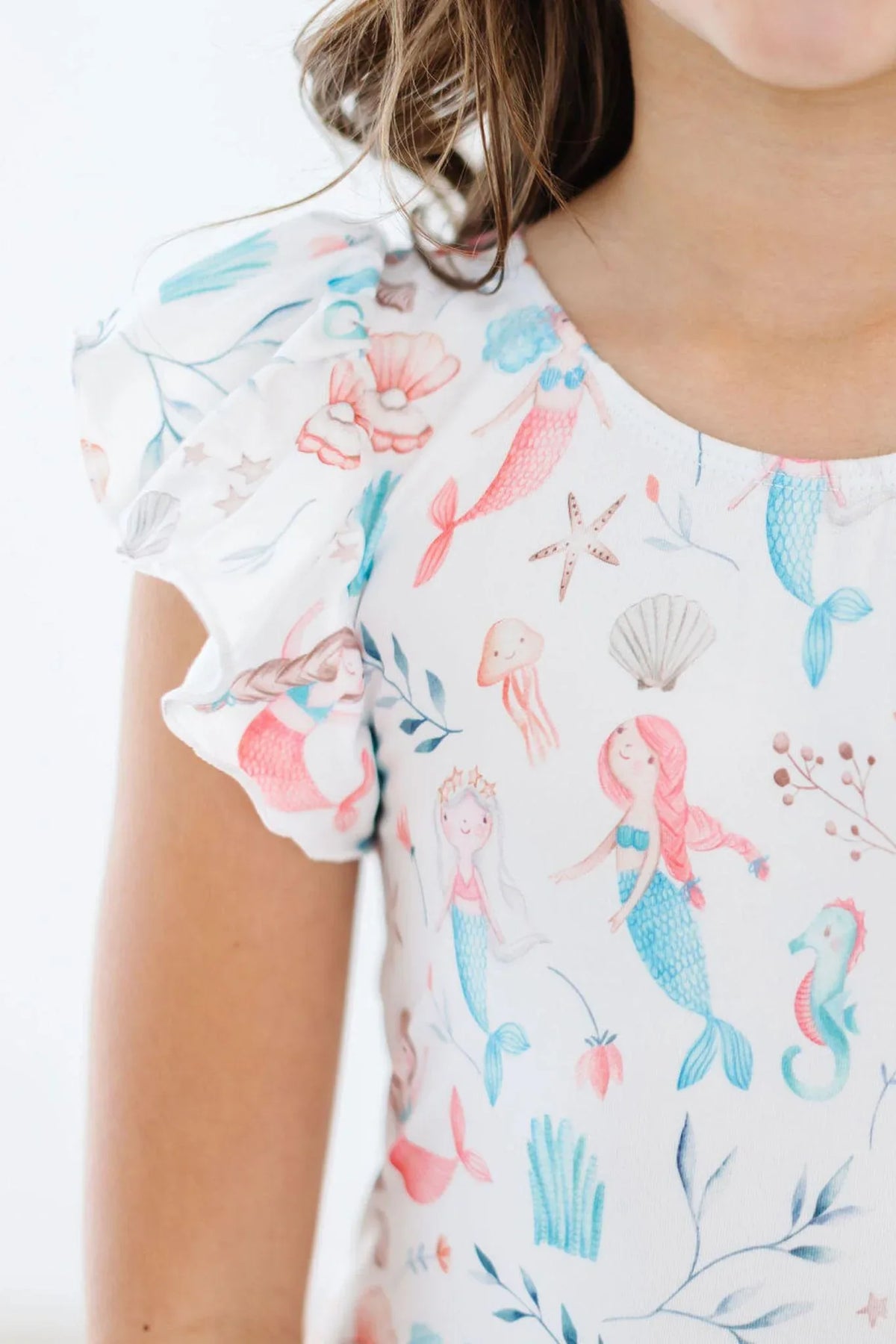 Girls white flutter sleeve mermaid leotard for girls with colorful sea creature print