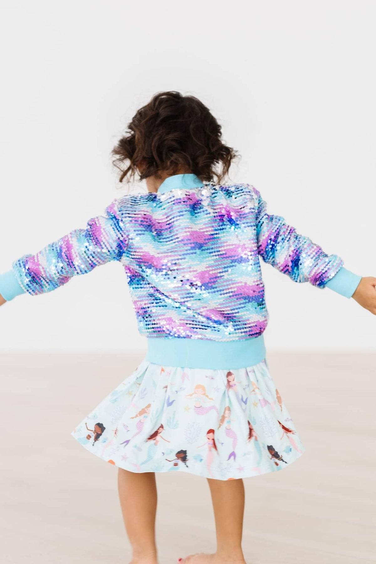 Girls mermaid sequin jacket for girls in blue purple with long sleeves and ribbed cuffs