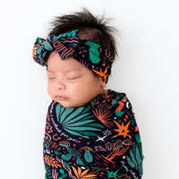 Baby wearing Desert Cactus (Midnight) SoftKnot Bow head-wrap in colorful cactus print on CozyMa fabric.