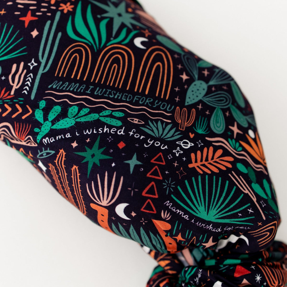 The Forever Swaddle Blanket Desert Cactus (Midnight): oversized 48x48 bamboo-blend fabric with cactus and desert motif.