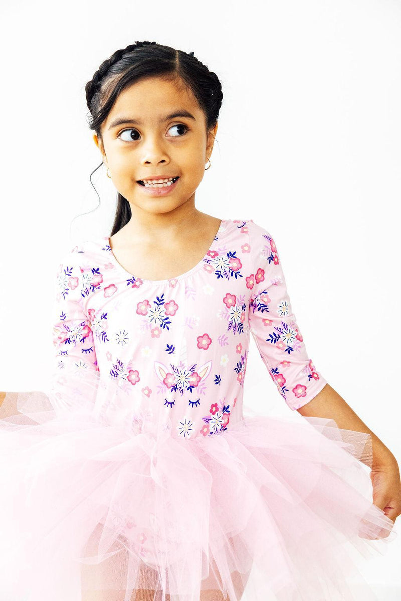 Close-up of the Retro Daydream 3/4 Sleeve Tutu Leotard, highlighting the beautiful fabric blend and fairy-tale design ideal for imaginative play.