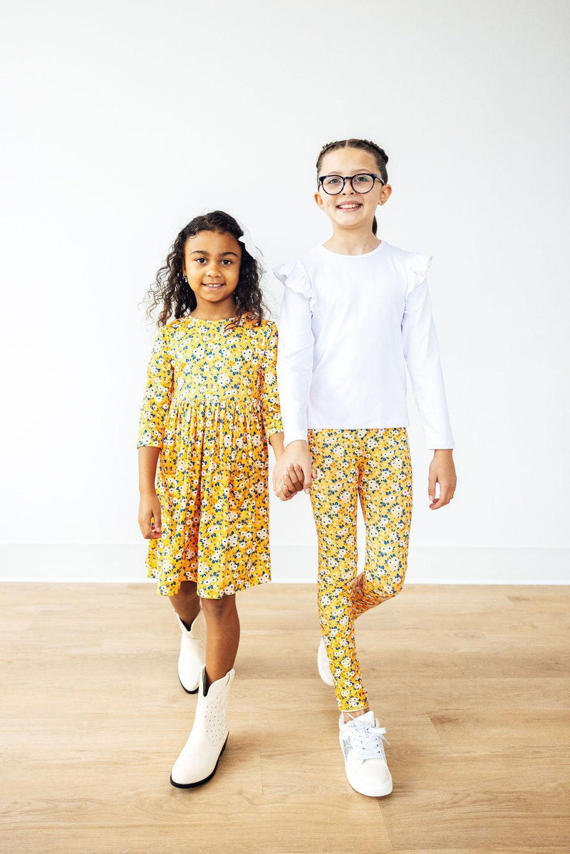 Playful Fall Floral 3/4 Sleeve Pocket Twirl Dress, featuring a scoop back and ballet neckline, perfect for twirls and fun adventures!