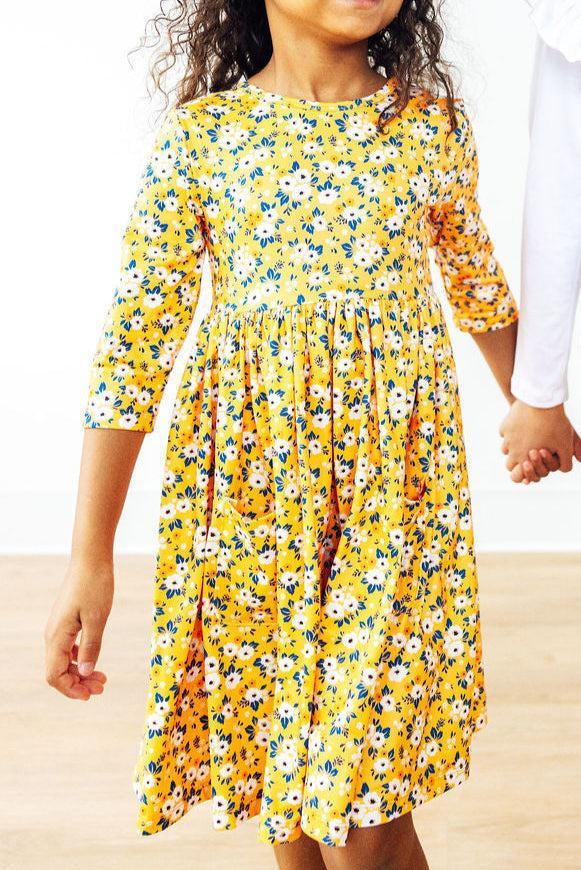 Adorable Fall Floral 3/4 Sleeve Pocket Twirl Dress from Mila & Rose, perfect for your little dancer with its full twirl skirt and charming floral pattern.