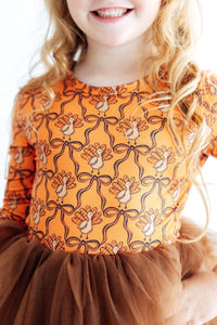 Orange long sleeve tutu dress for girls featuring a turkey and ribbon print with a brown tulle skirt.