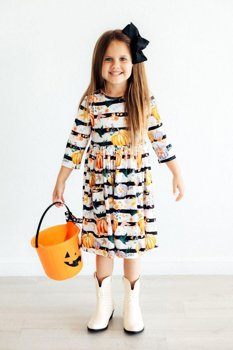 Pumpkins & Peonies 3/4 Sleeve Pocket Twirl Dress ideal for twirling adventures and stylish play, featuring a vibrant design, comfy fabric, and handy pockets for little treasures!