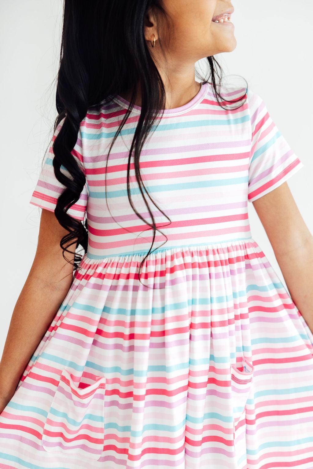 Pastel Stripes Short Sleeve Twirl Dress For Girls with Pockets, a perfect girls twirl dress for playful adventures.