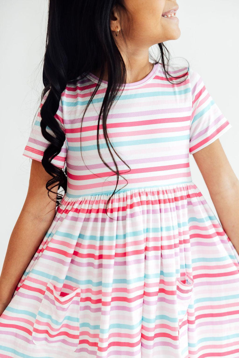 Pastel Stripes Short Sleeve Twirl Dress For Girls with Pockets, a perfect girls twirl dress for playful adventures.