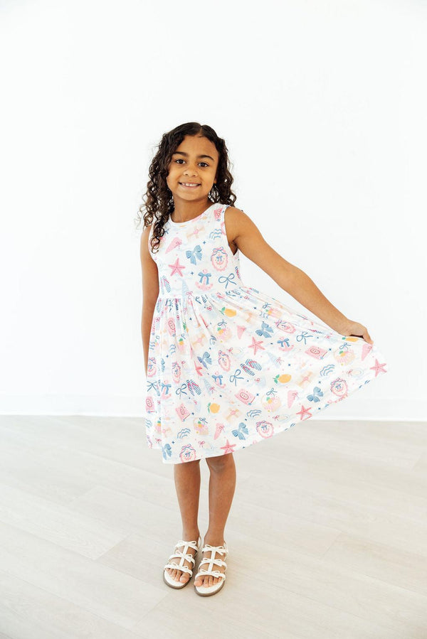 Seaside Sweetheart Tank Twirl Dress, sleeveless with scoop-back, twirly skirt, pastel sea-print for school and play.
