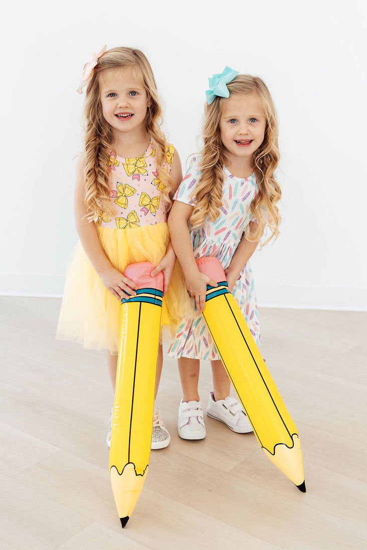 Vibrant Color Crayons Short Sleeve Pocket Twirl Dress for Girls with a full twirl-ready skirt, ideal for school and special occasions.