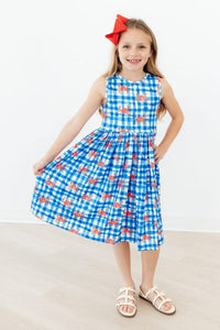 Charming Crabby Cutie Tank Girls Twirl Dress capturing joyful moments with its colorful crab print. A delightful choice for a girls twirl dress.