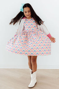 Watercolor Rainbows Short Sleeve Pocket Twirl Dress with scoop back, ballet neckline, and full twirl skirt