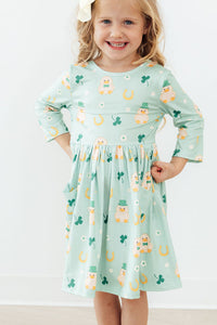 Lucky Duck mint 3/4 sleeve pocket twirl dress with scoop back, ballet neckline, and full twirl skirt.