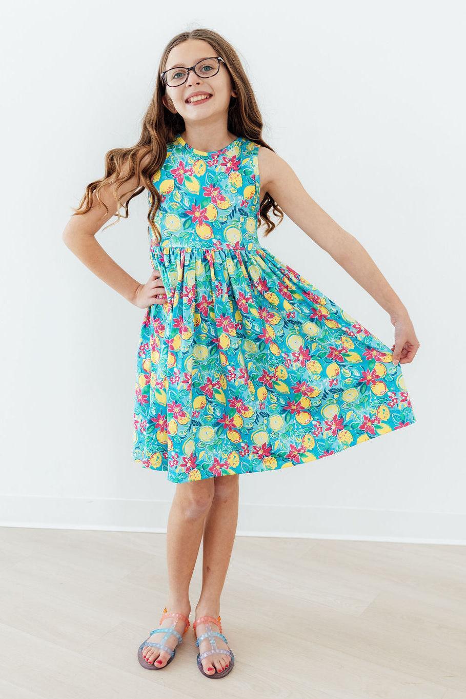 Summer Squeeze Tank Twirl Dress: turquoise floral twirly dress for school and play with a comfy scoop back.