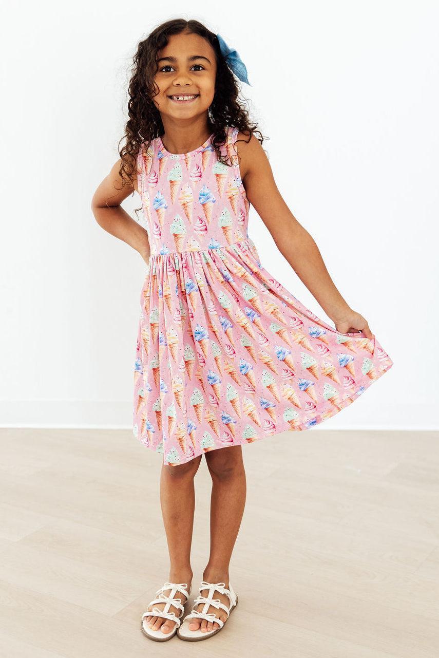 Close-up of the fabric of the Ice Cream Dreams Tank Twirl Dress For Girls, comfortable and vibrant twirl dress for girls.