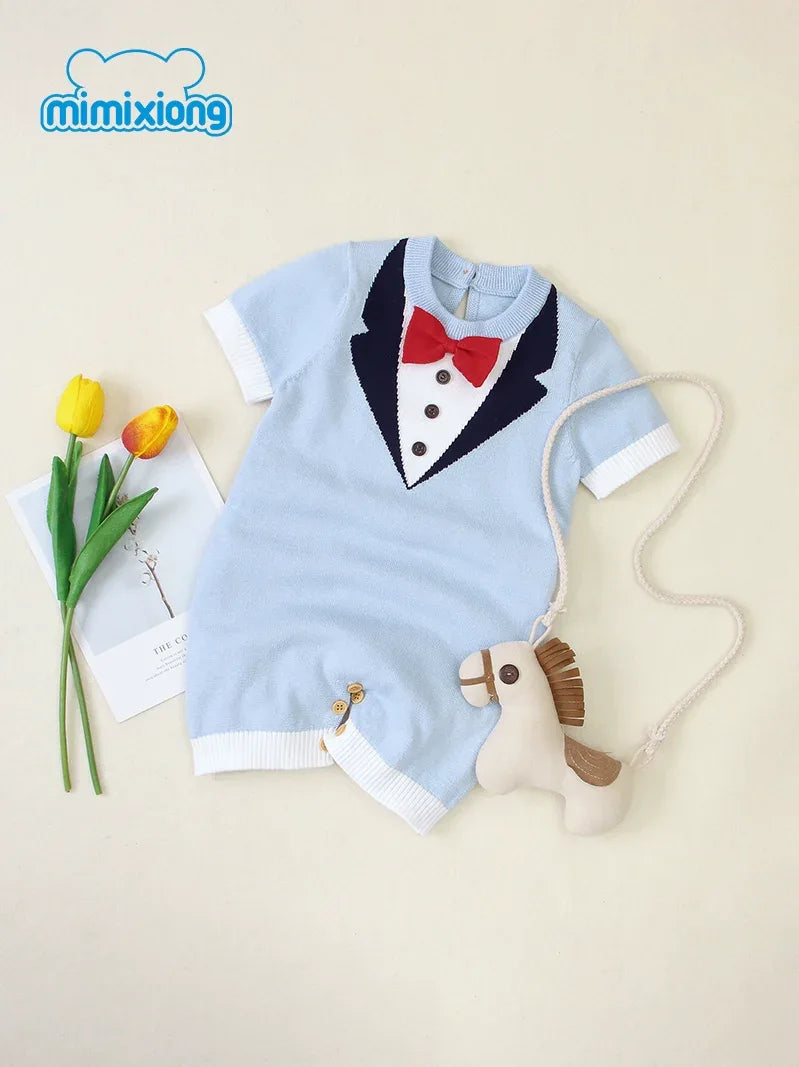 Light blue baby boy knit romper with tuxedo print and red bow tie for newborn to 12 months