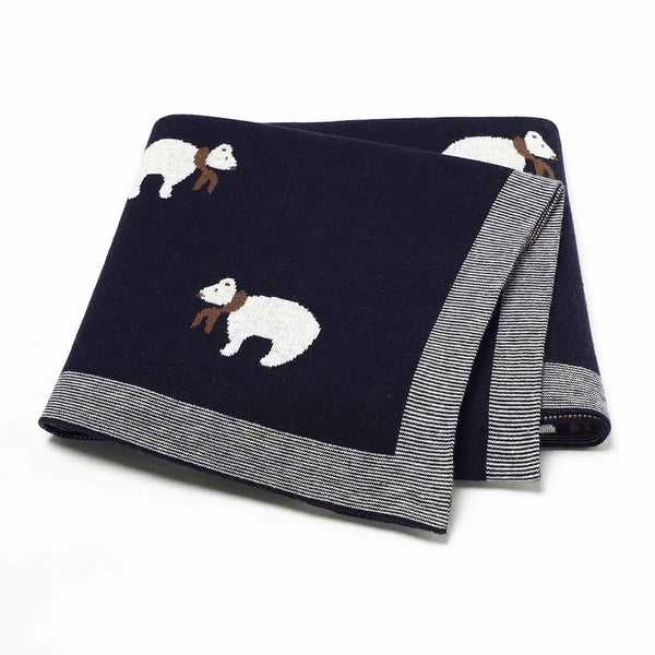 Navy blue cotton baby blanket with white bear design and gray striped edges for infants