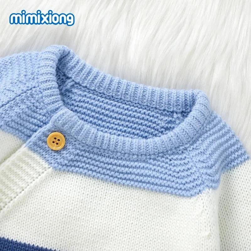 baby knit romper in blue and white with wooden button detail, cozy and soft fabric