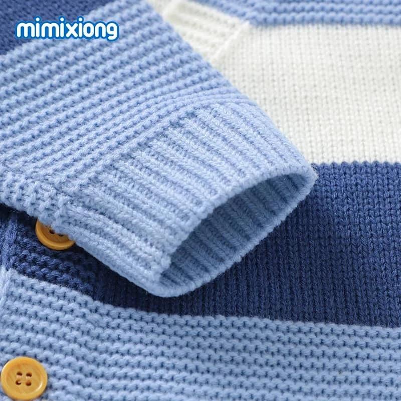 baby blue knit romper for infants with navy and white stripes and wooden button details