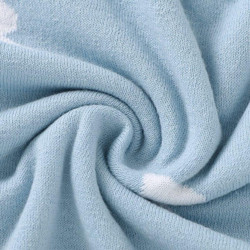 Soft baby bunny blanket in light blue with white bunny pattern, perfect for newborns and infants