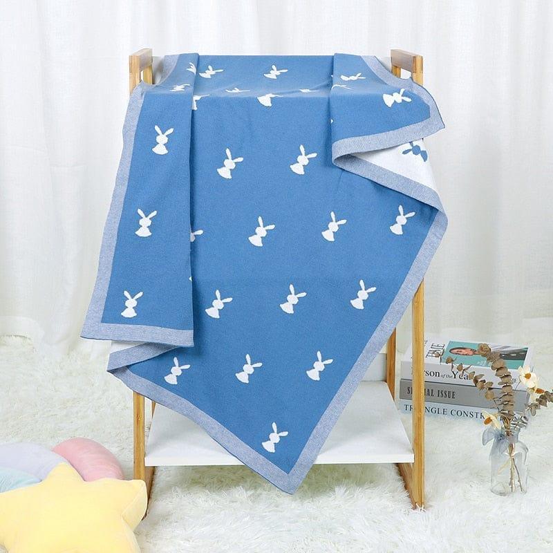 Blue soft baby bunny blanket with white bunny pattern, perfect for newborns and toddlers, lightweight and cozy