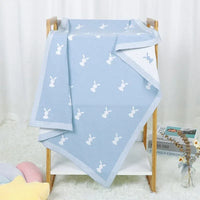Soft baby bunny blanket in light blue with white bunny pattern, perfect for infants and toddlers