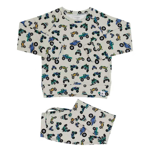 Monster Mash crew neck jogger set featuring a colorful monster truck print on cream fabric for stylish, cozy comfort.