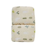 Goosewaddle Murphy Comfy Cradle baby pillow in cream with cactus and animal print for newborns