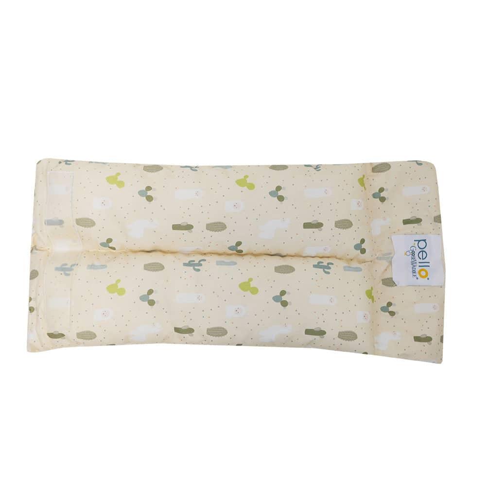 Murphy Comfy Cradle baby pillow in beige with green cactus print for newborns