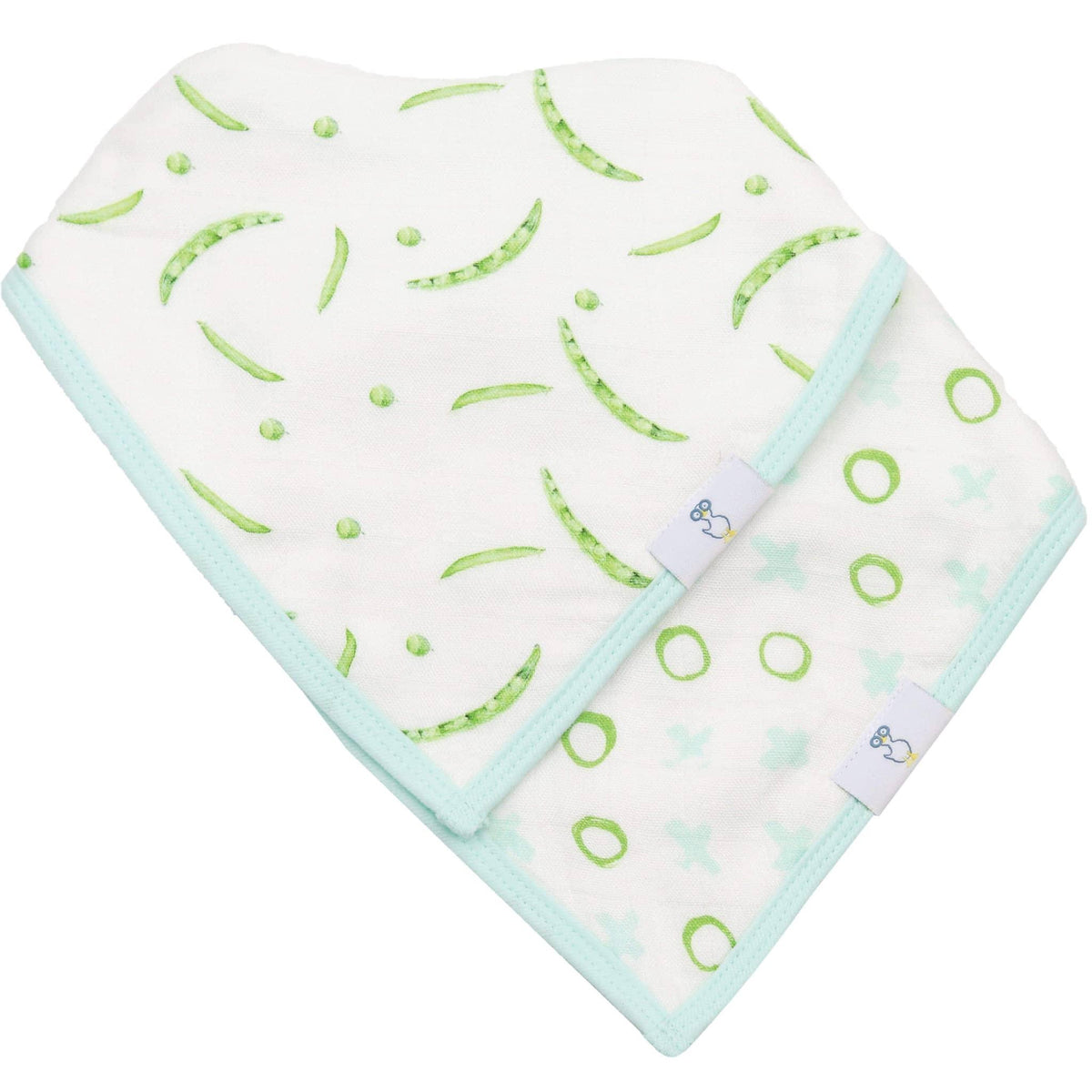 Two muslin and terry cloth baby bib set pieces in white with green pea pod and circle patterns for newborns