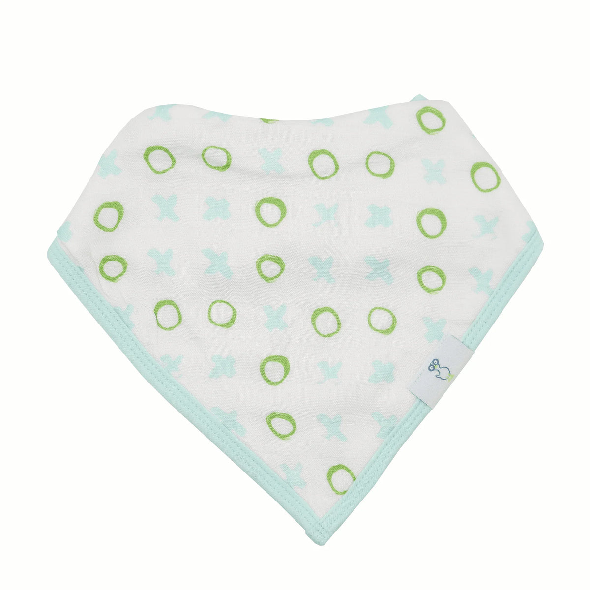 Newborn baby wearing white and green muslin and terry cloth baby bib set with circle and star patterns