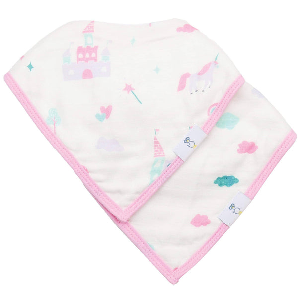Newborn baby wearing pink edged muslin and terry cloth baby bibs with castle and unicorn prints