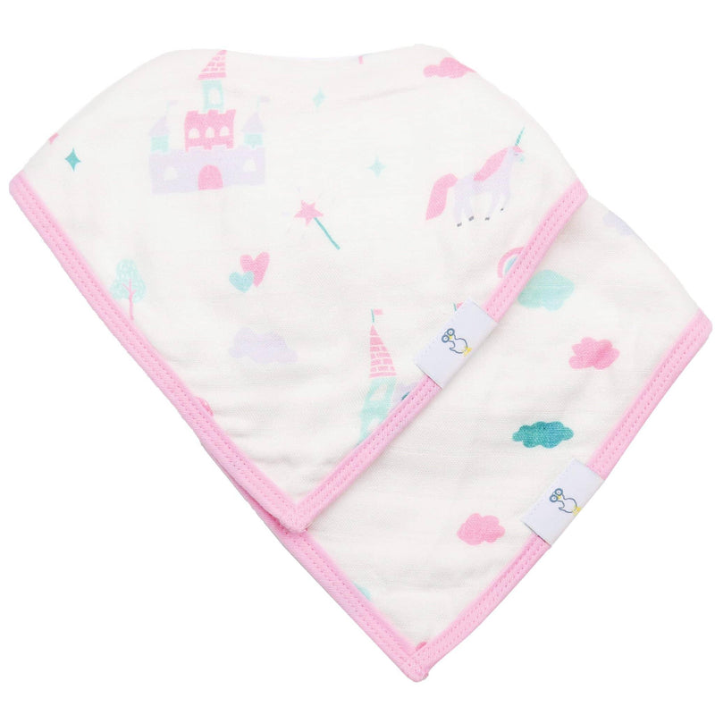 Newborn baby wearing pink edged muslin and terry cloth baby bibs with castle and unicorn prints
