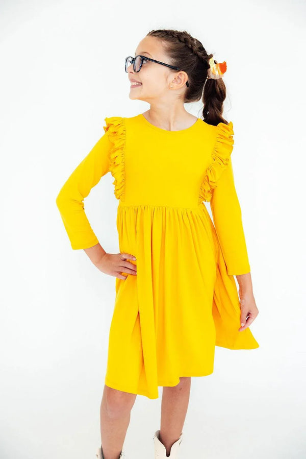 Girls mustard ruffle dress long sleeve twirl dress with shoulder ruffles by Mila & Rose