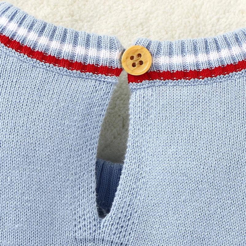 Light blue knitted nautical baby outfit for infants with white and red striped collar and wooden button