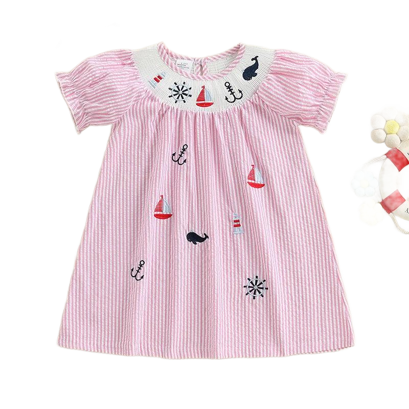 pink and white striped nautical dress for babies with embroidered anchors and sailboats