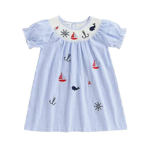 light blue and white striped nautical smocked dress for girls with embroidered sailboats and anchors